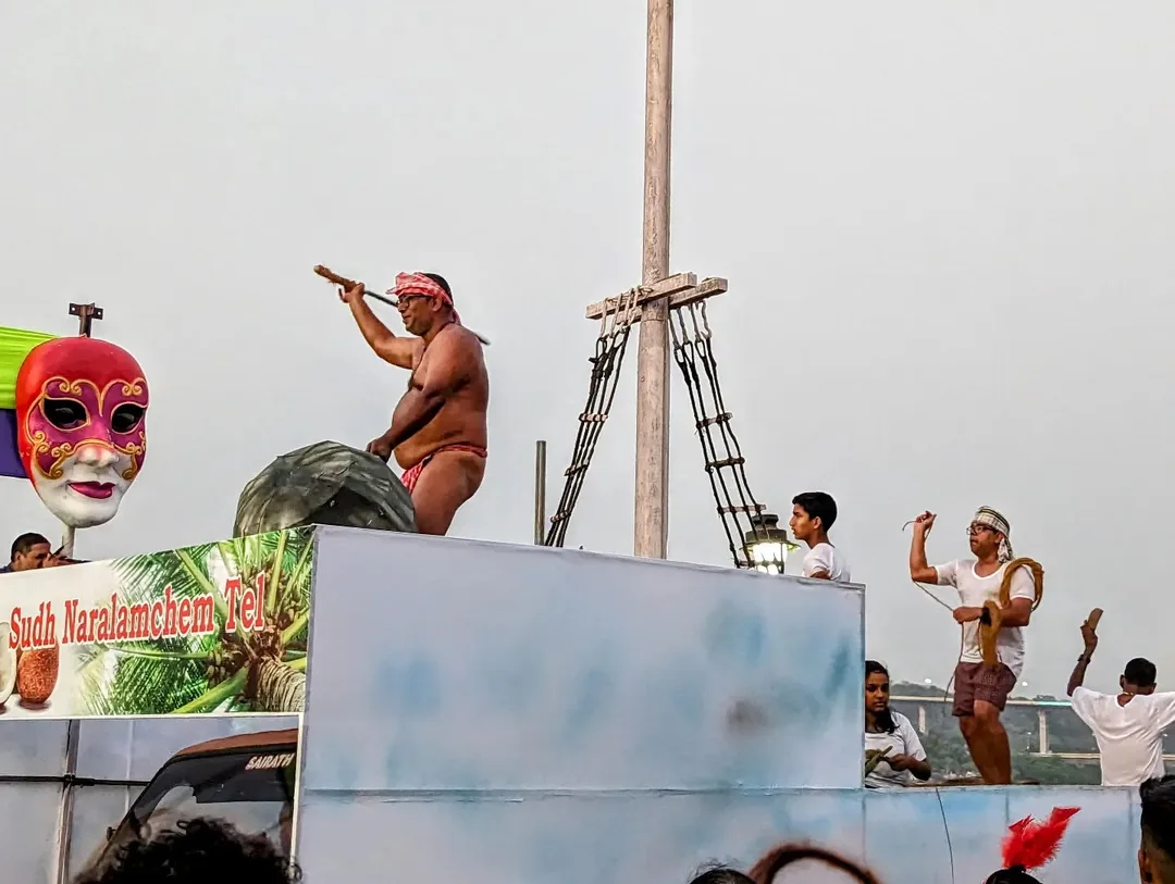 Some scantily clad men were seen promoting the virtues of coconut oil. Women were having a field day photographing this guy's naked butt.