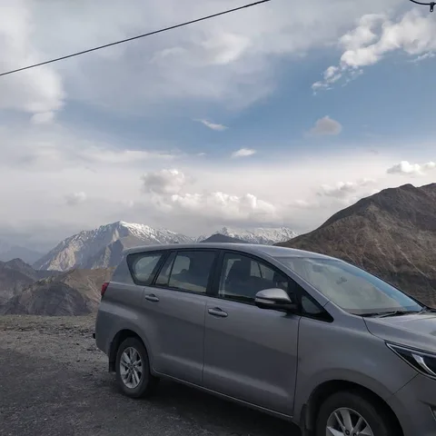 We have done 1,003 km so far, and the mileage has averaged out to 11.7/100km, over plains and mountains. This is still a
