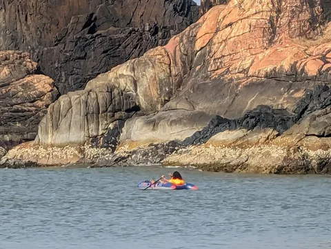 The elder one dialed things up a couple of notches and took the dinghy out into the sea. The island was too rocky and he