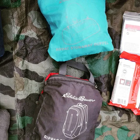 Here's a whole bunch of closeups of our gear. Safety stuff, backpacks, cooking stuff, pillows, umbrellas, etc. Are we mi