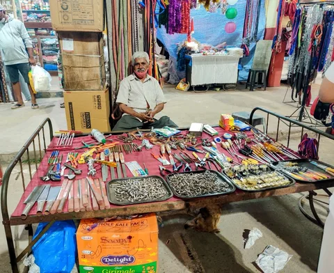 This gentleman owns a tools stall in Mapusa Municipal Market. Doesn't have a lot of stock like the big shops, but he had