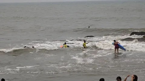 Surfing near Chennai is definitely an extreme sport. Rocks, Heavy surf, and dozens of people in the same spot. The chill
