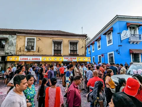 This Gomes is a goner. He had a Mardi Gra-esque party going on outside his bar, with drunk ladies attracting a lot of at