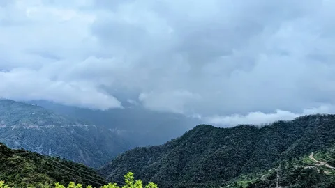 Don't go into the #mountains in the #monsoons, they said. We've been driving through #clouds and the #rain for hours now