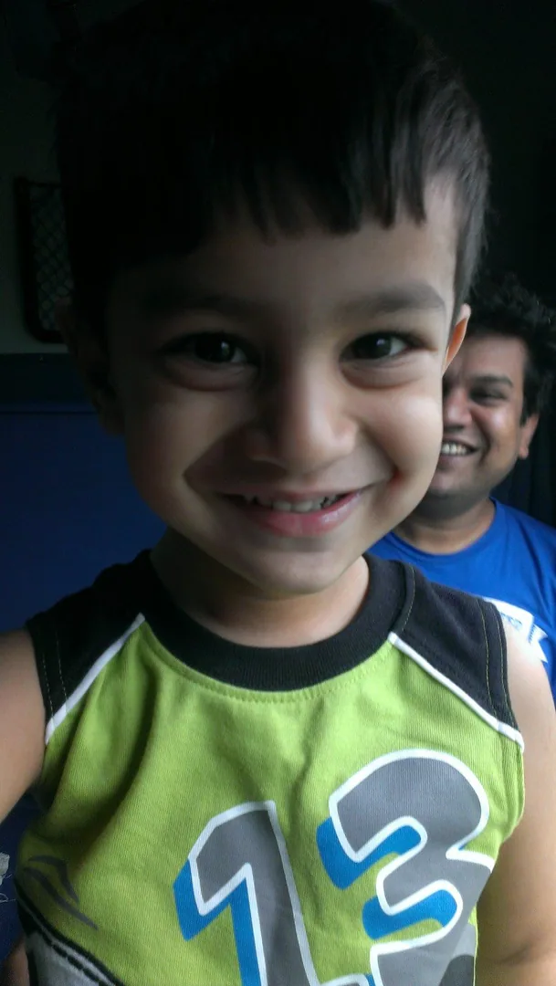 Kavin enjoying a long distance train ride on his fourth birthday