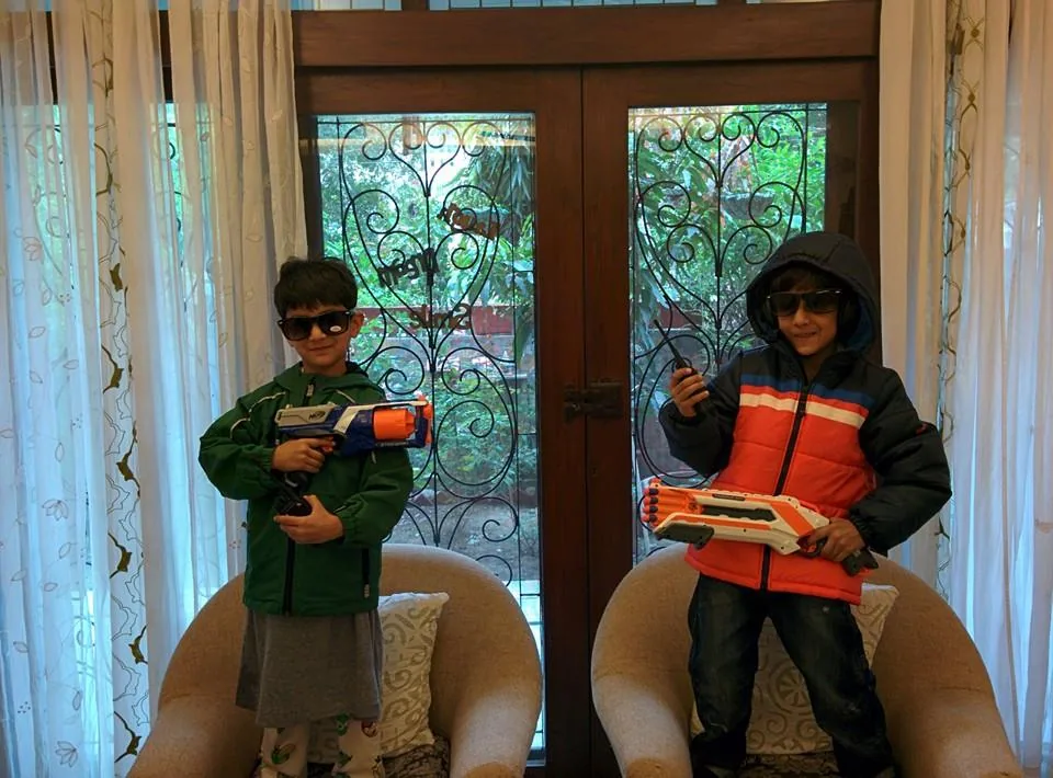 The boys are in full combat gear!

Kavin is wearing an oversize T shirt that looks like a nightshirt, in case you were w