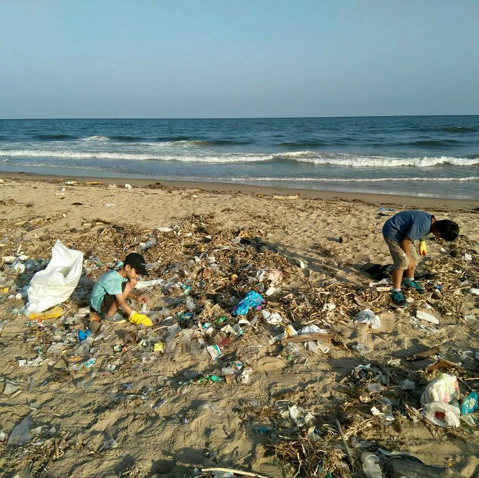 Our quick visit to the beach to help in cleanup. A big thanks to Nityanand for pointing us that way. It was good meeting