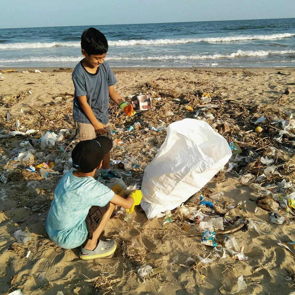 Our quick visit to the beach to help in cleanup. A big thanks to Nityanand for pointing us that way. It was good meeting