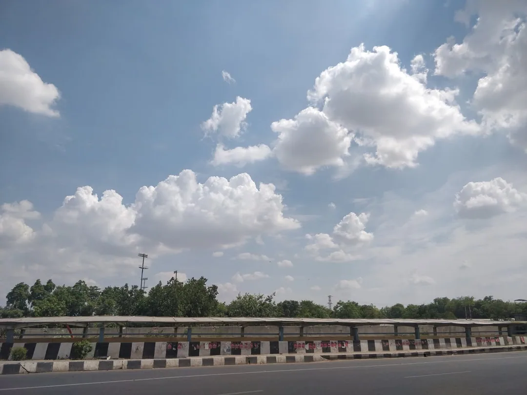 Beautiful blue skies with soft, cottony clouds painted shades of pearl and silver. AQI 130. If you are in Gurgaon now, s