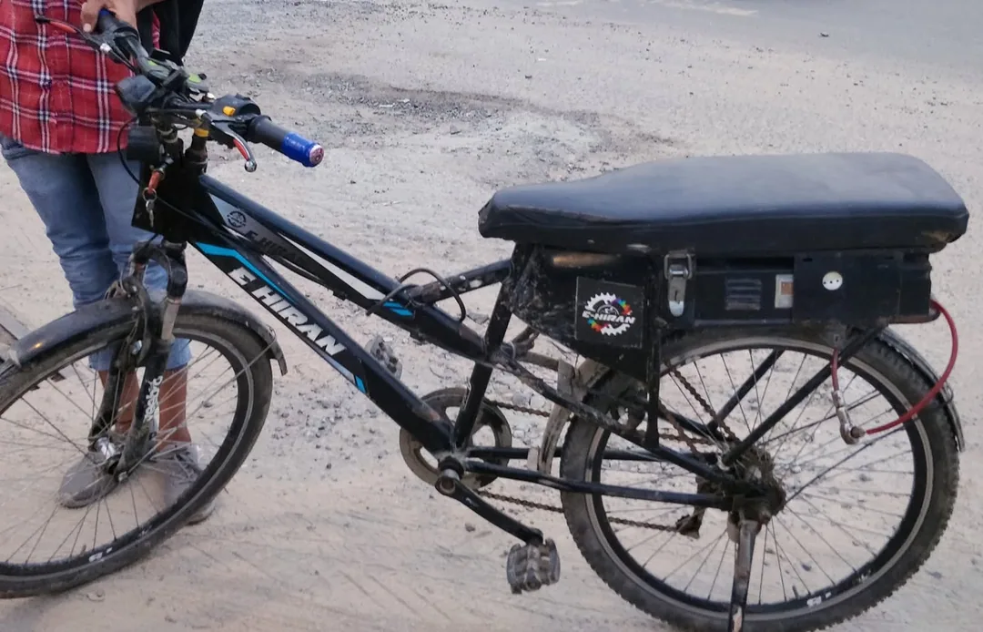 Was driving around town when I saw this guy riding this souped up bicycle. Requested him to pull over so I could take so