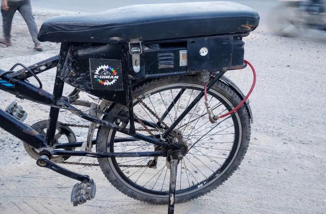 Was driving around town when I saw this guy riding this souped up bicycle. Requested him to pull over so I could take so