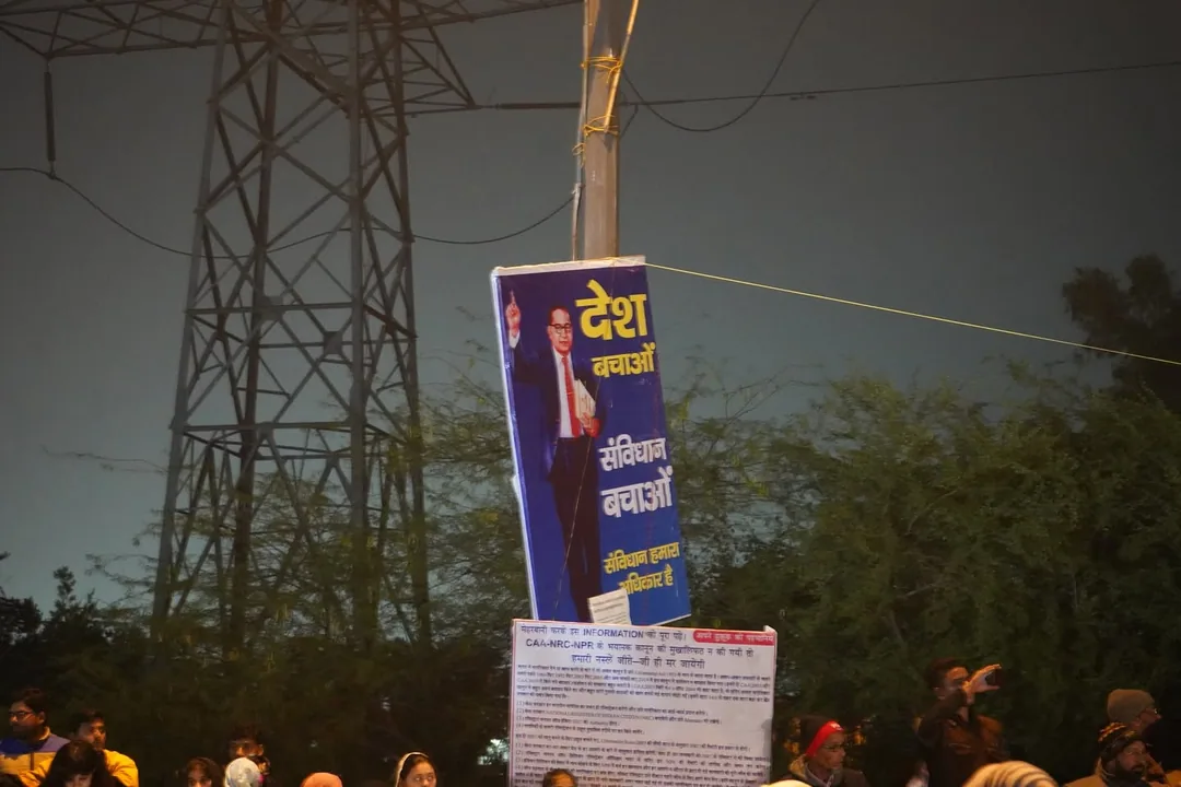 The setting is very urban. These women are squat in the middle of one of the busiest roads in Delhi, that connects South