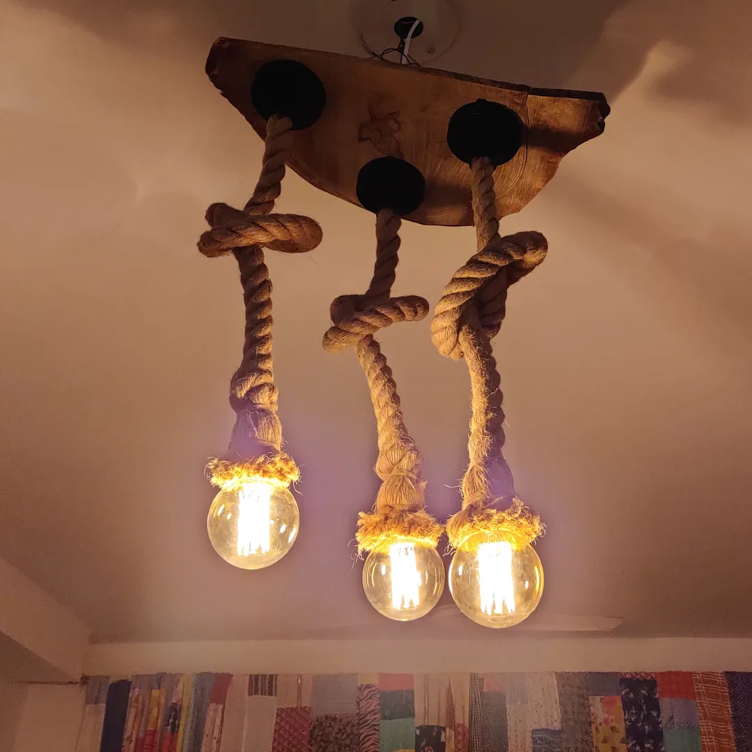 Meanwhile, à¤¬à¤¡à¤¼à¥ à¤¨à¤µà¤¾à¤¬ has made this lighting fixture using reclaimed wood and some old wires, and lightin