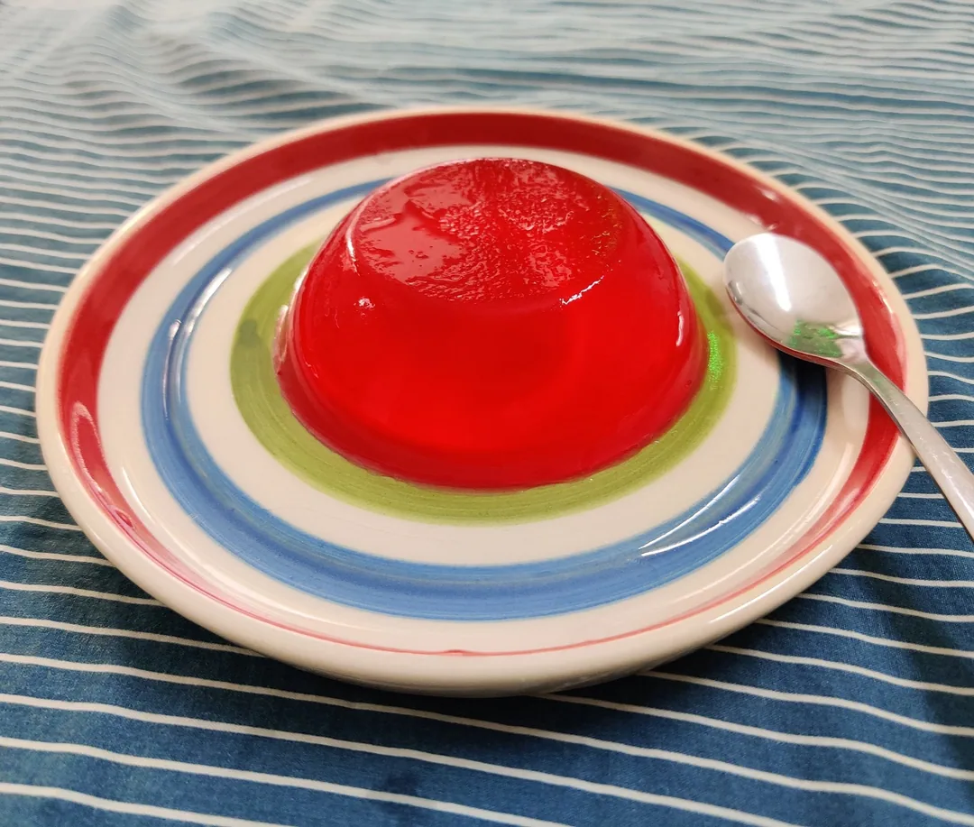 Le birthday jelly. Courtesy Kavin.

(Quarter plate from Banjara Market. Spoon from IKEA. Bedsheet, source unknown. Jelly