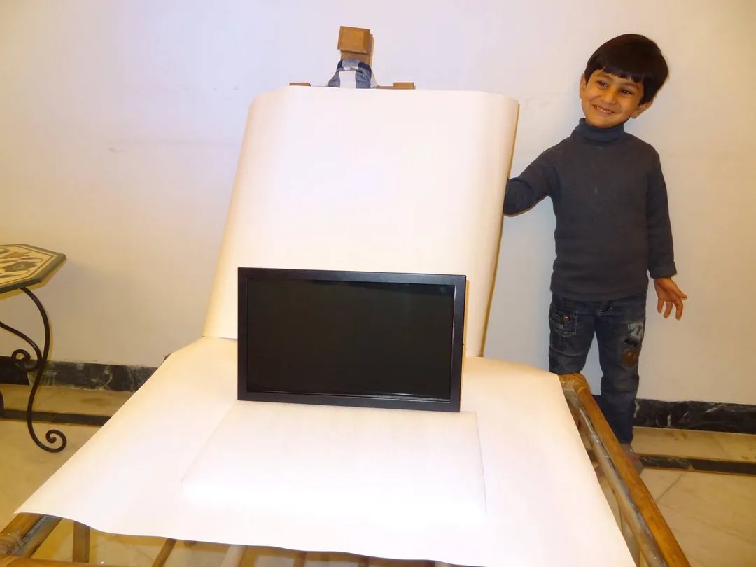 Who's cuter? The computer or the kid?

PS: I was involved in the making of both :p