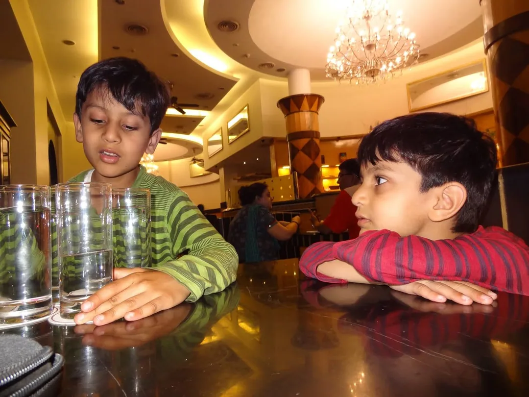Reliving the kids' travel through photos they took.