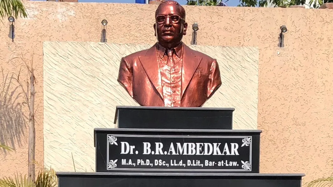 In the center of Mahabaleshwar's main market is a statue of Babasaheb. Under the statue, as is customary, his degrees ar