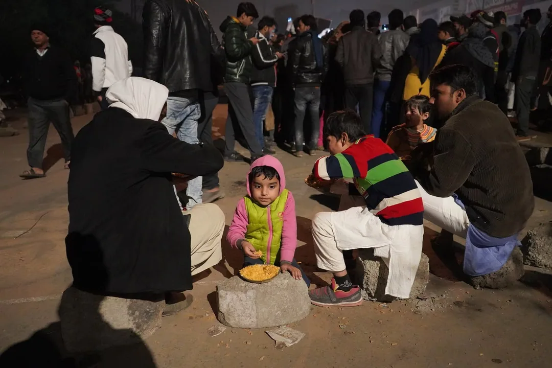 Then there is a lot of food. People keep carting in food and distributing it out the open trunks of their cars. Photogra