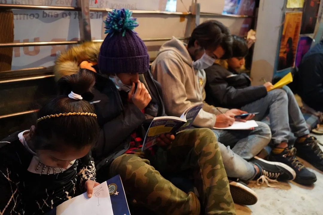 Reading a book. Learning to sketch. Lots of activities for the kids.